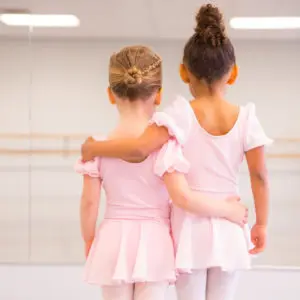 Pre-K Creative Movement students at Cavod Performing Arts facing away from the camera.