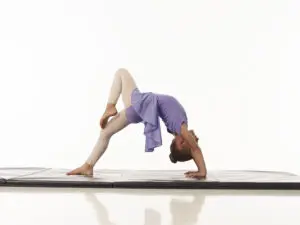 A young acrobatic dance student posing at Cavod Performing Arts.