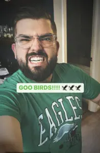 A man cheering on the Philadelphia Eagles while at Cavod Performing Arts' Manheim, PA studio.