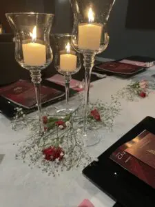 Candles, and table dressing for the beautiful dinner theatre at Cavod | Coffee with Connie March 2023 