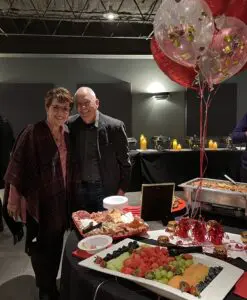 Connie Dienner and her husband at a banquet.