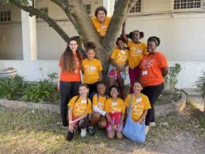 Staff and children from Cavod Academy taking a group picture while on a missions trip in Capetown