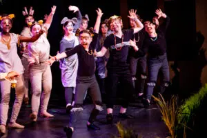 A section of the ensemble of characters for Cavod Academy's production of Lion King Junior the musical