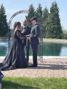 Cavod Academy's Hand to Hand Combat Teacher Caleb Zimmerman and his wife at their wedding ceremony.