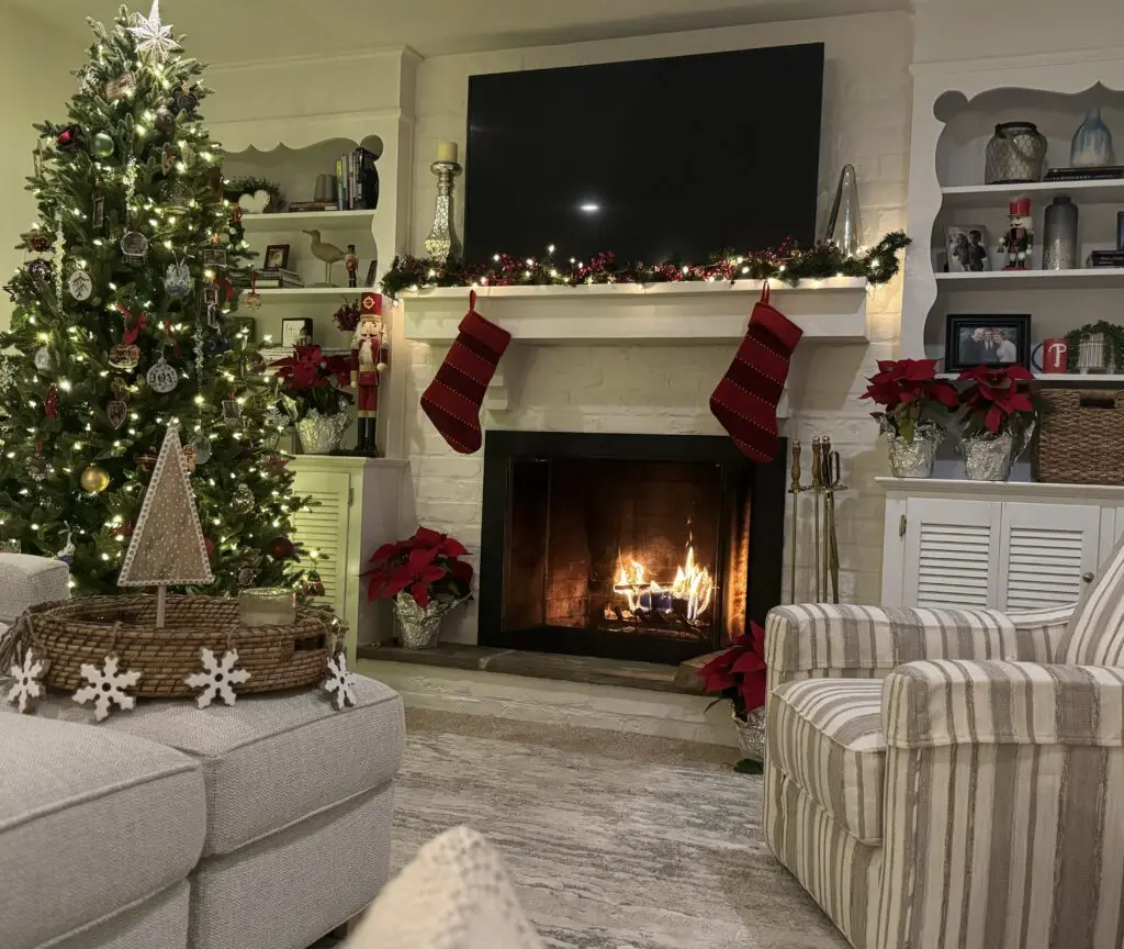 Cavod's Executive Director Connie Dienner's fireplace and living room decorated for Christmas.