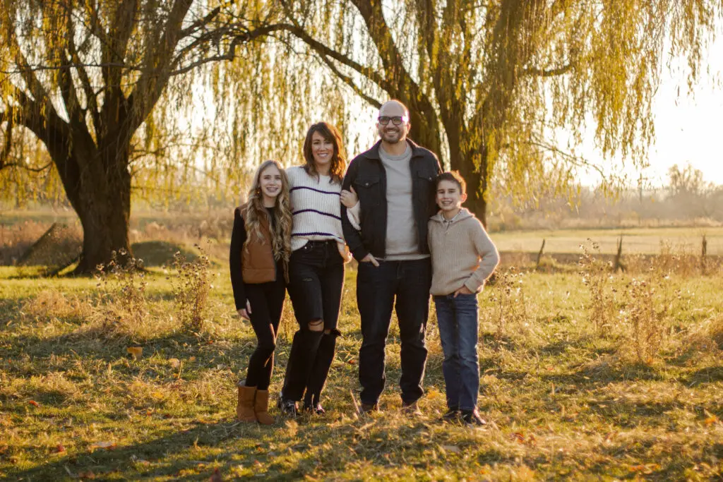 Connie Dienner's son and his family taking a photo together.