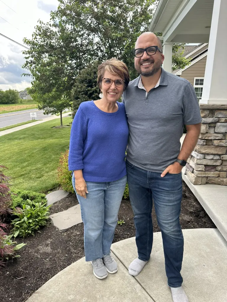 Connie Dienner' taking a picture with her oldest son 
