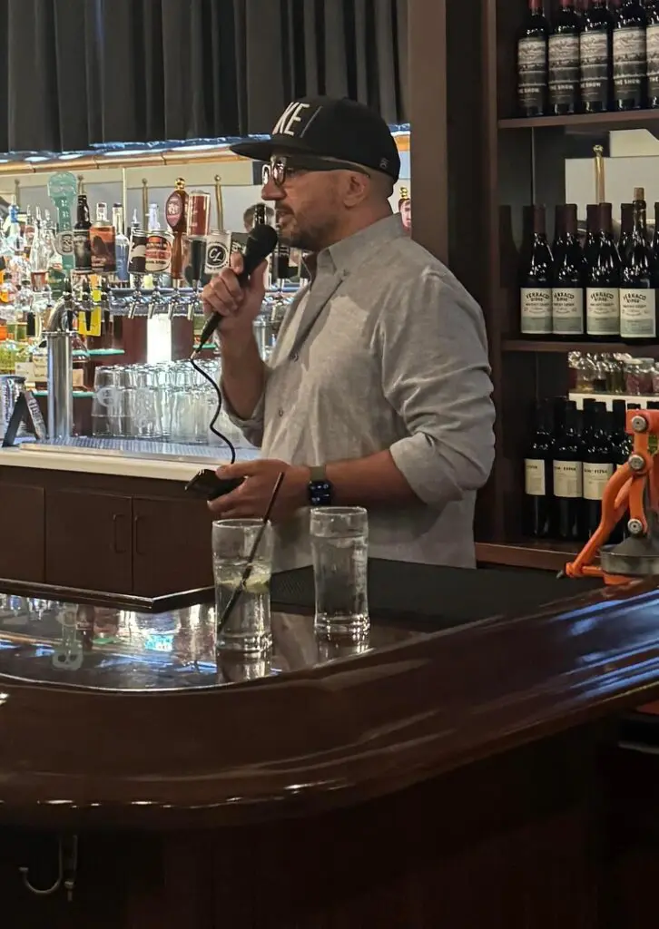 Connie Dienner's son speaking at a Make Film event