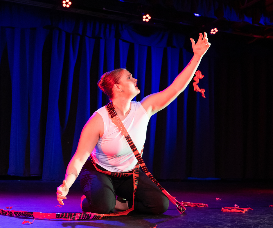 An Ornate Dance Theatre member performing on stage