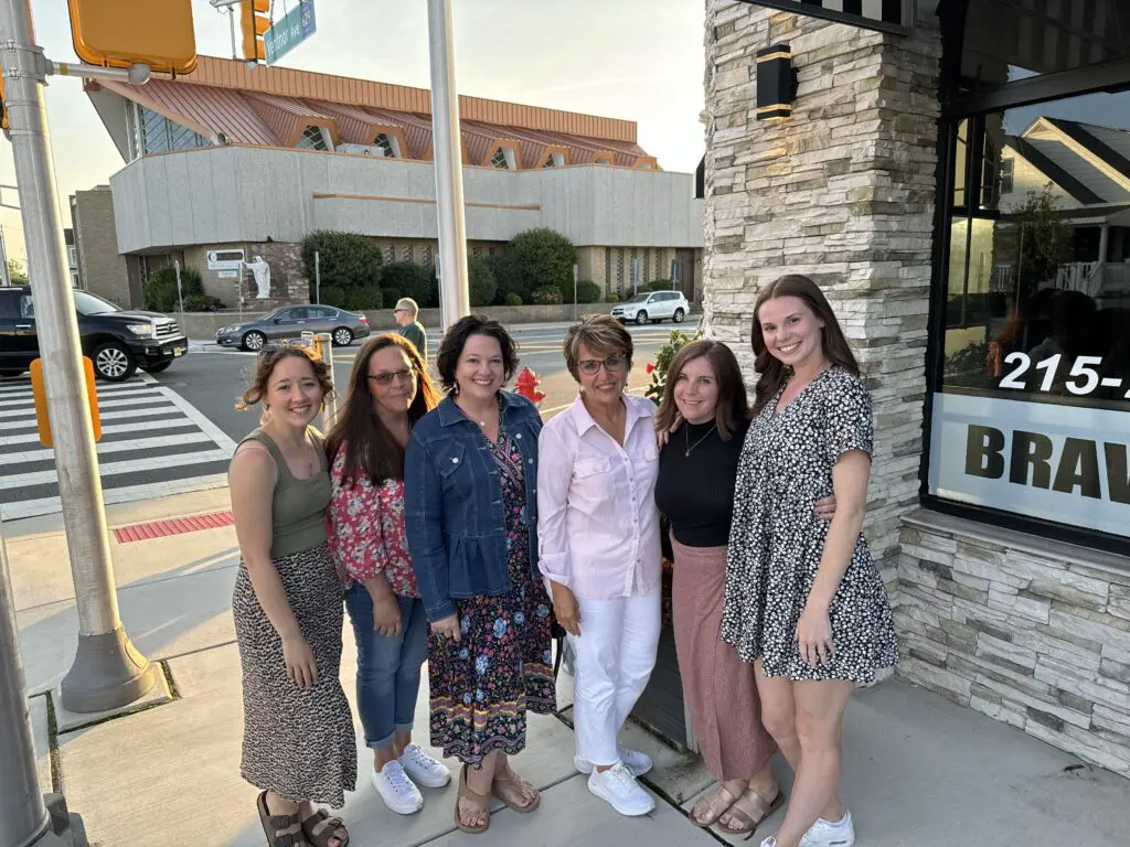 Cavod's leadership team posing for a picture on a street corner