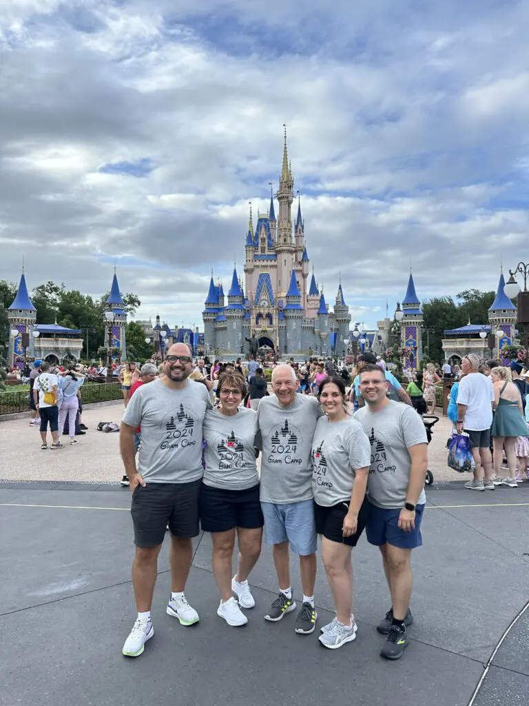 Connie Dienner and family taking a picture at the Disney World castle