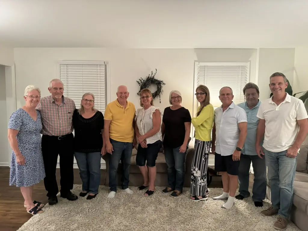 Another group family photo of Cavod's executive director Connie Dienner's family in her living room