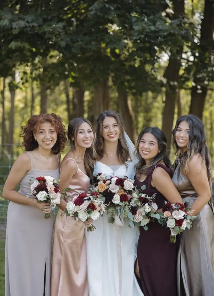 The bridesmaids and the bride from Abby and Josiah's wedding