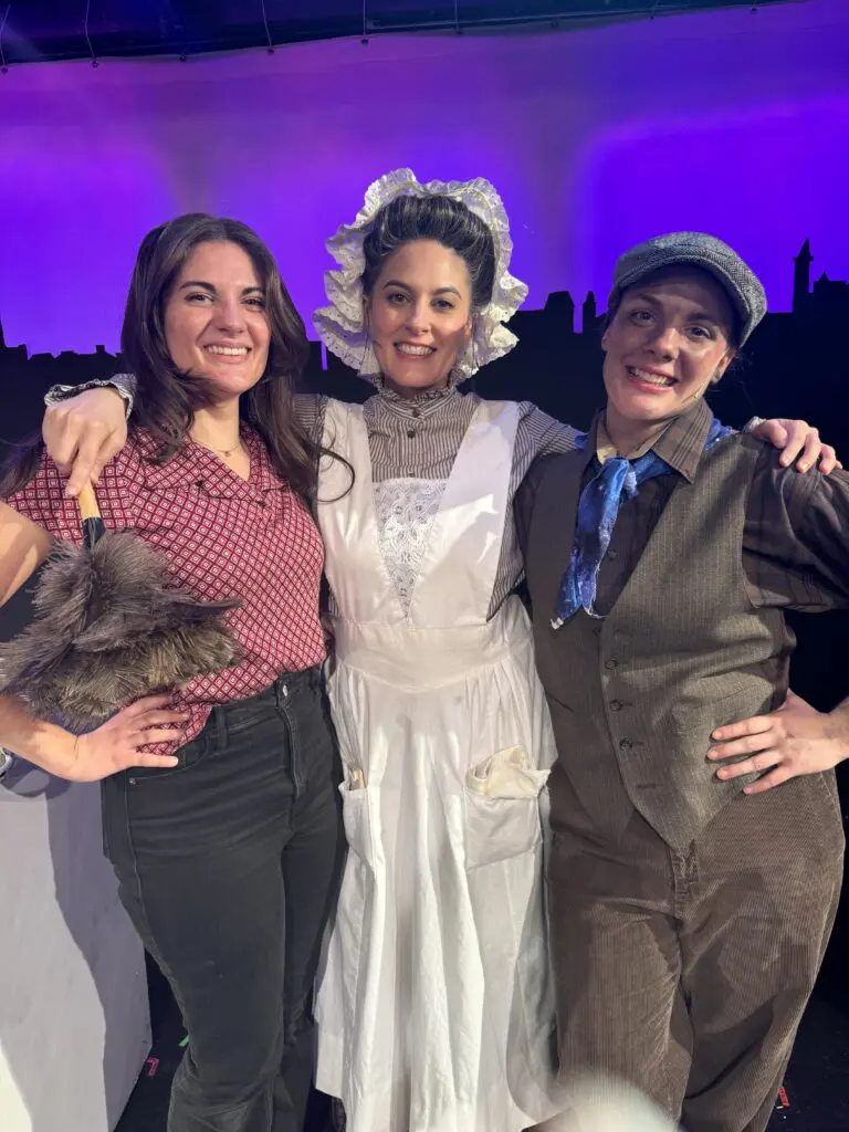 Kim Tortalono, pictured in the middle, with daughters Lenae on the left, our costume designer, and Mylee on the right.