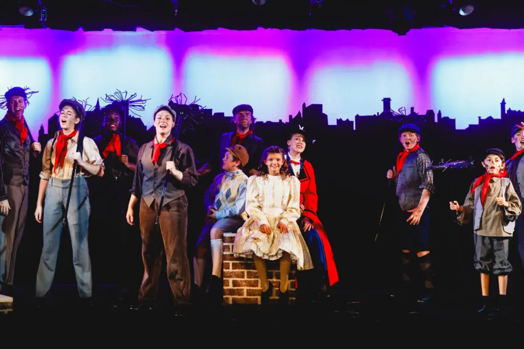 Group of children in costume during a scene from Mary Poppins in Lancaster, PA, bringing charm to the production.