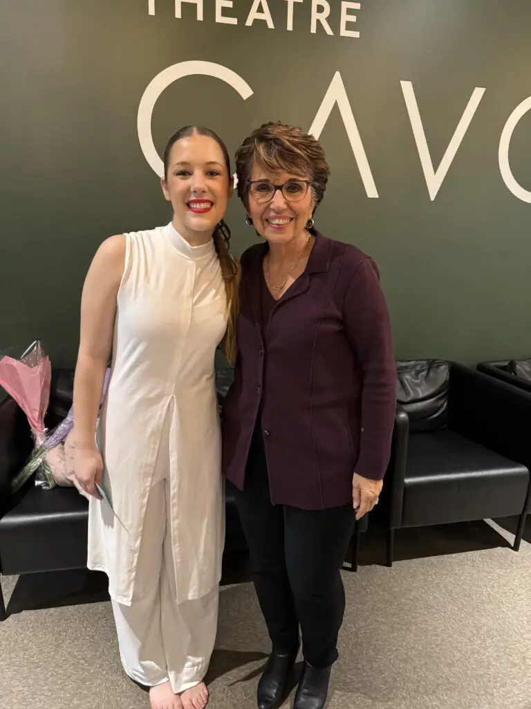 Connie smiling with her granddaughter Aaliyah at Cavod Performing Arts, celebrating their shared love for dance and ministry.