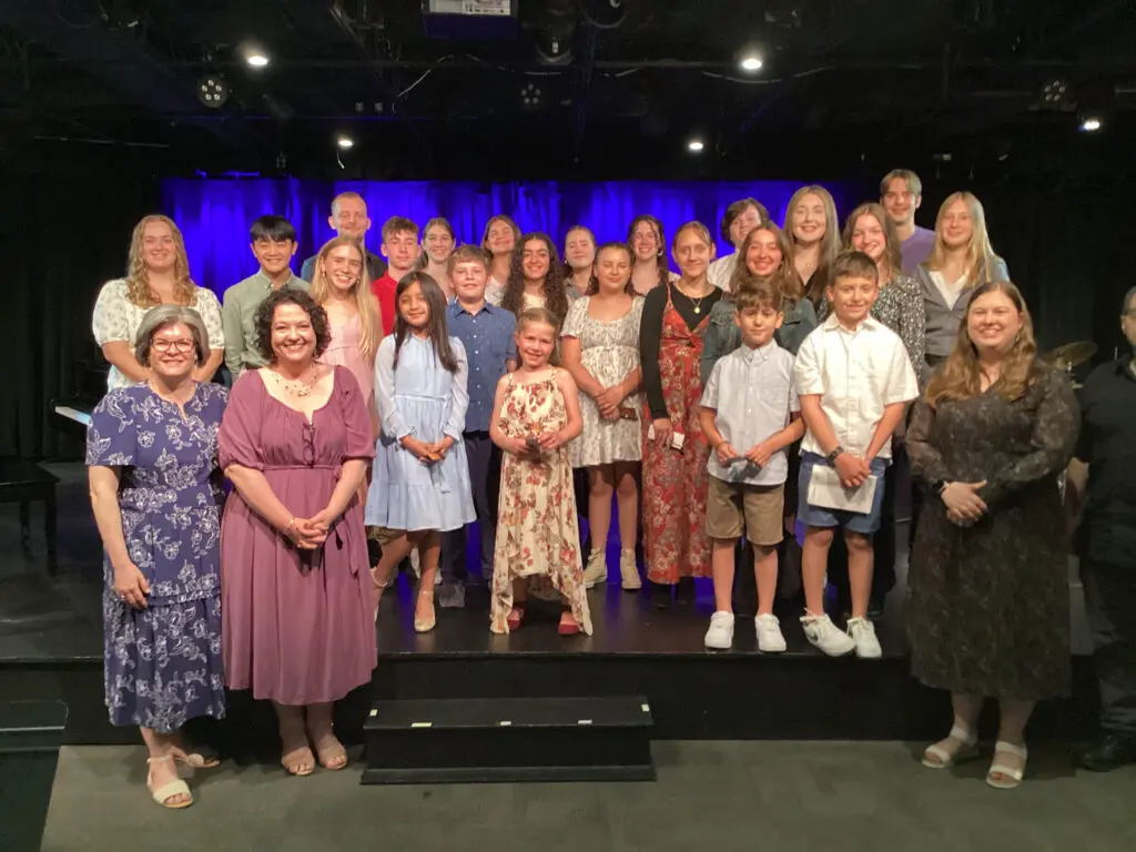 students and teachers in Cavod recital