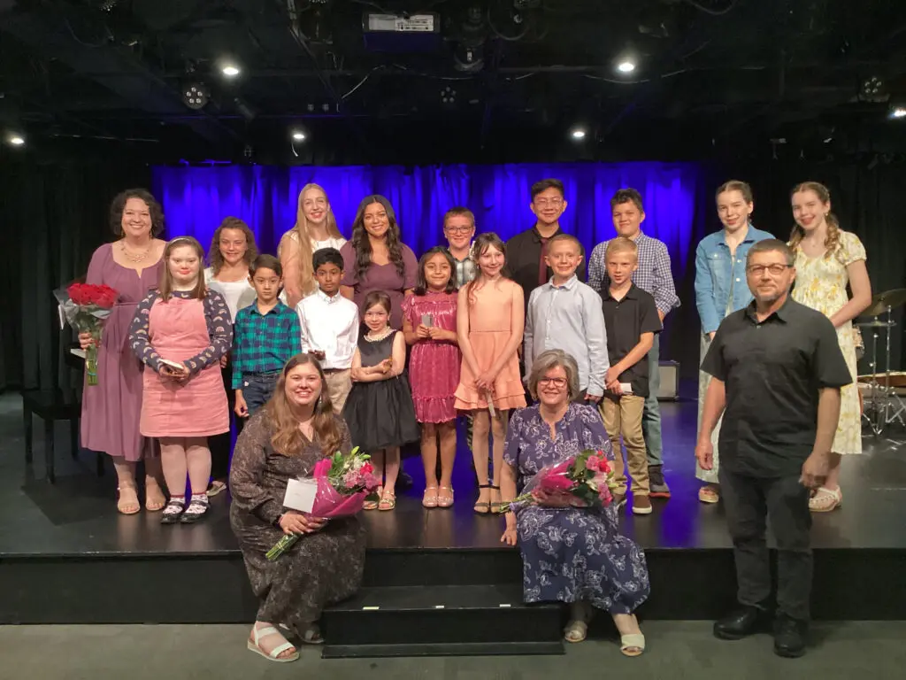 students and teachers in Cavod recital