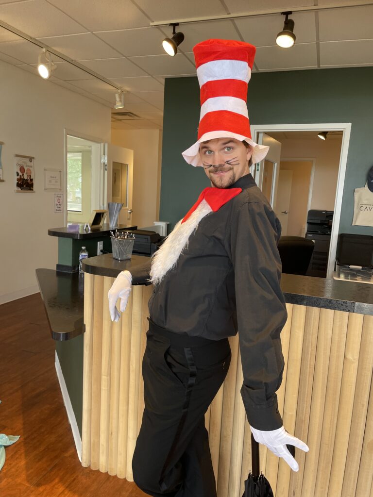 A man dressed as Cat in the Hat at Cavod's open house event