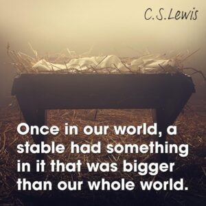 A picture of a manger with a quote from C.S. Lewis. 