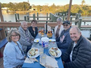 Cavod Academy's Executive Director Connie Dienner enjoying a meal with friends. 