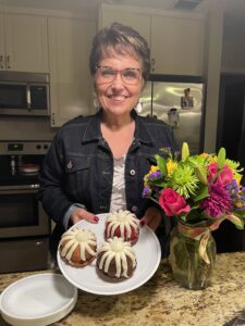 Cavod Academy's Connie Dienner showcasing one of her favorite dessert items, red velvet cake. 
