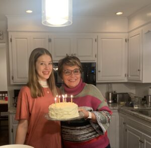 Cavod Performing Arts' founder Connie Dienner taking a picture with her granddaughter.